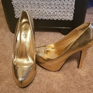 Gold platform heels
